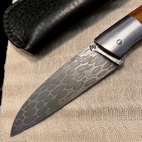 Couteau à cran forcé