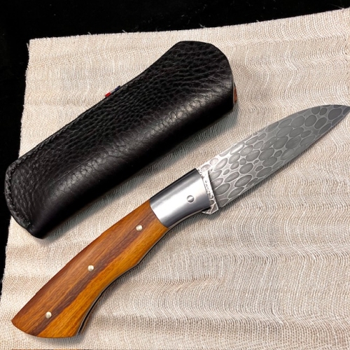 Couteau à cran forcé