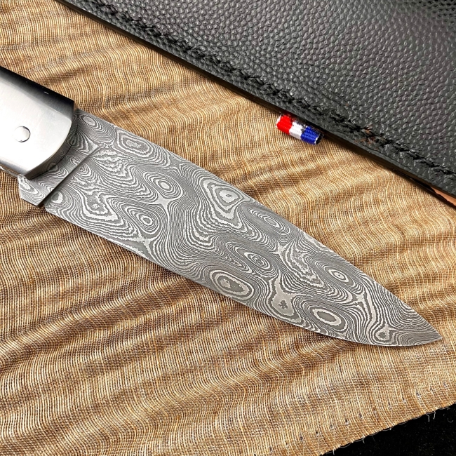 Couteau a cran forcé (vendu)