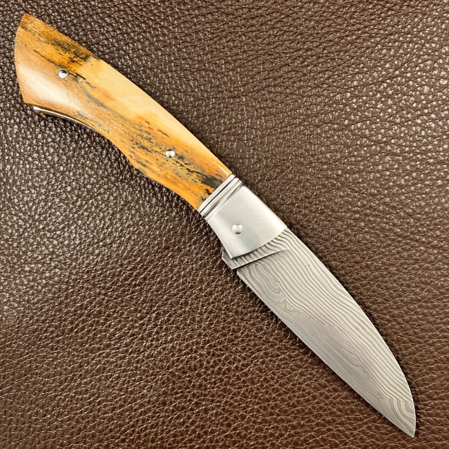 Couteau a cran forcé (vendu)